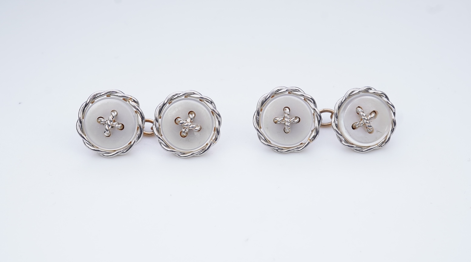 A pair of mother of pearl cufflinks, early 20th century